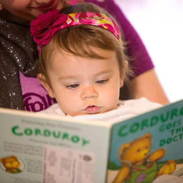 Baby reading photo